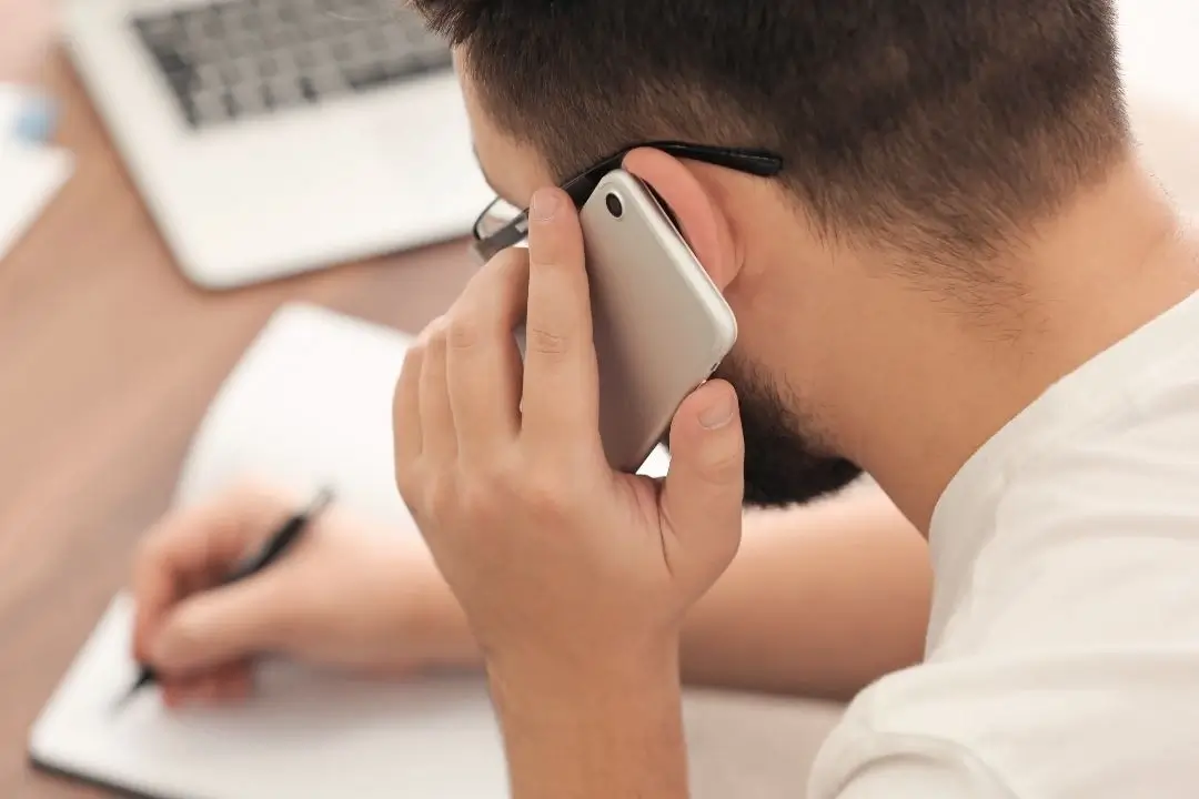 homeowner on the phone with a contractor homeowner on the phone with a contractor